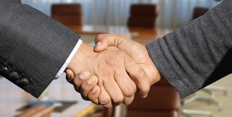 Investor shaking hands